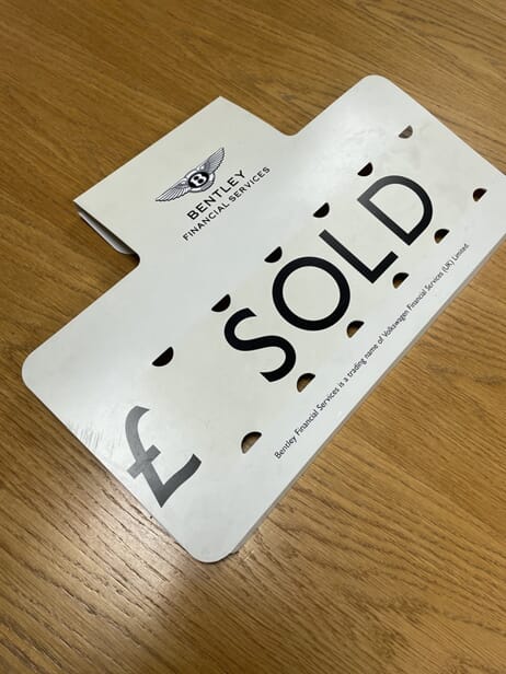 An image of showroom number plates.